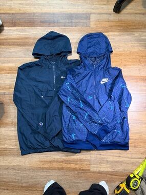 Two Youth Size Nike and Champions windbreakers